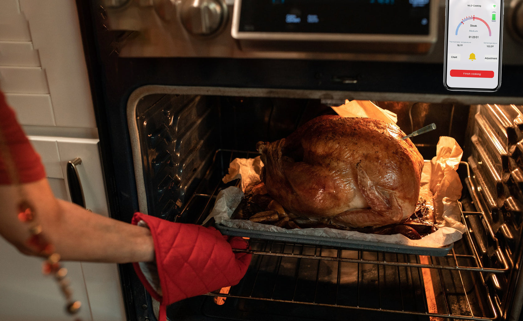 Roast turkey in the oven with a smart wireless meat thermometer